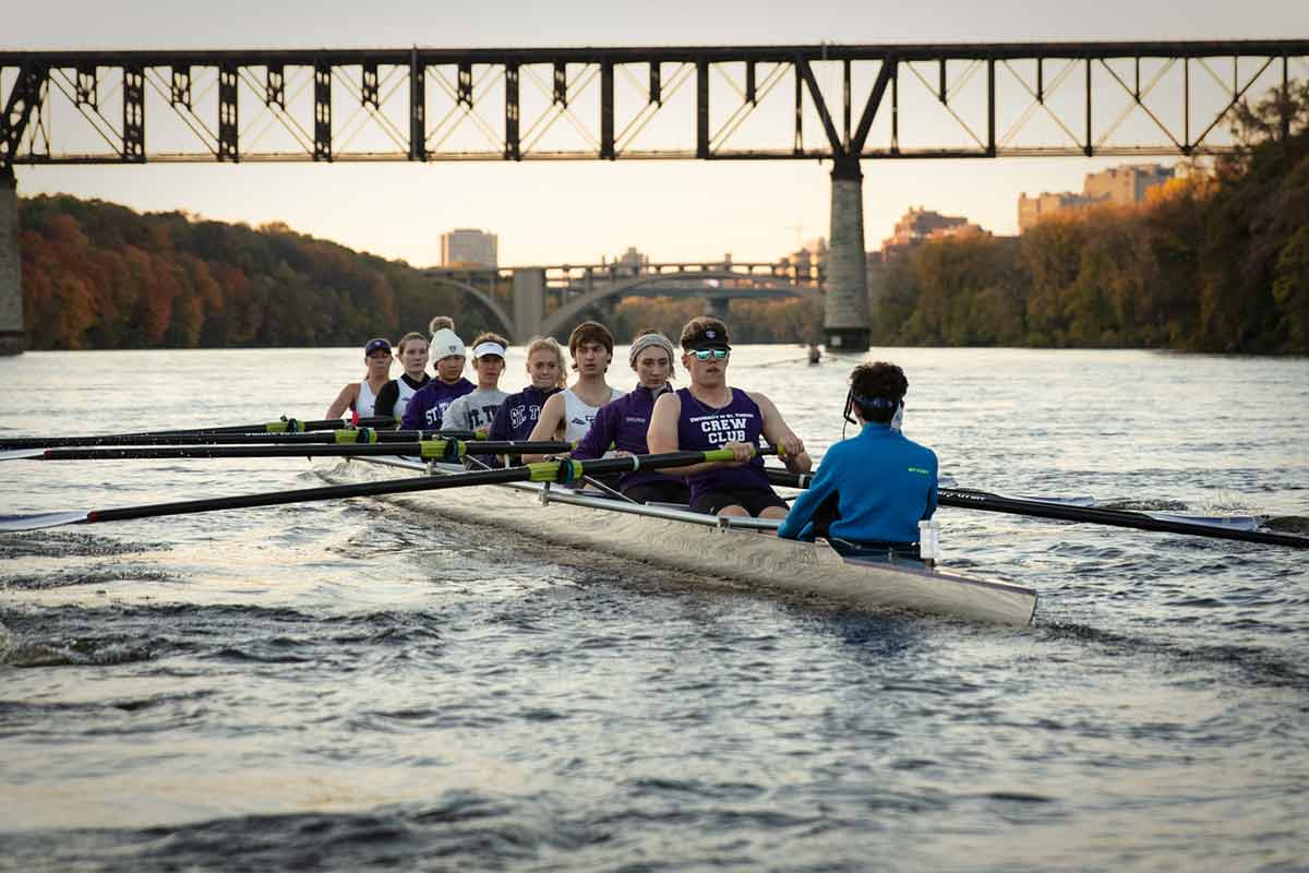 The St. Ҵý Rowing Team practices on the Mississippi River.
